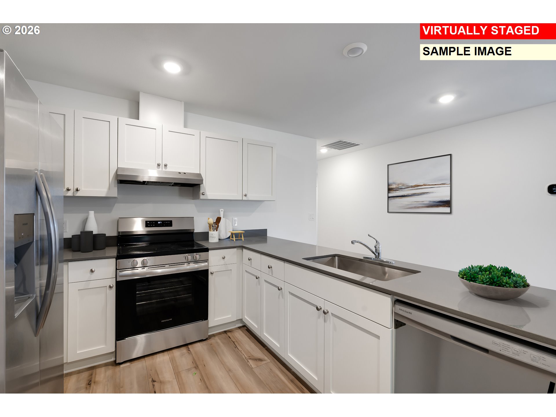 25255 Tanglewood Way Veneta, OR 97487 - Photo 6 of 47 a kitchen with stainless steel appliances granite countertop a sink a stove and cabinets