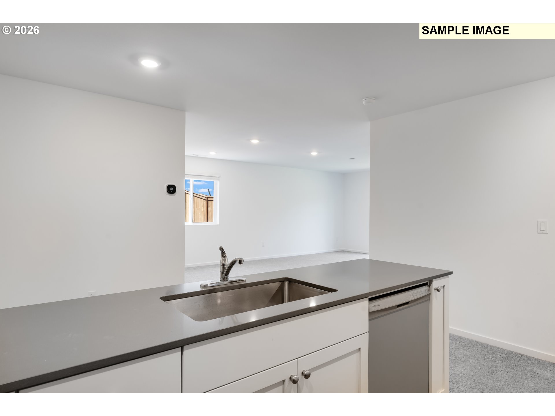 25255 Tanglewood Way Veneta, OR 97487 - Photo 10 of 47 a kitchen with a sink and cabinets