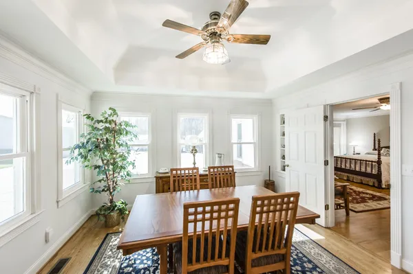 a view of a livingroom with furniture and a table