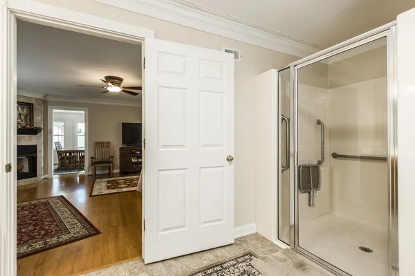 a bathroom with a sink toilet and mirror