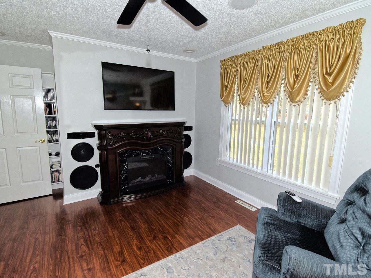 2004 Messer Road Raleigh, NC 27603 - Photo 16 of 28 a living room with furniture and a fireplace
