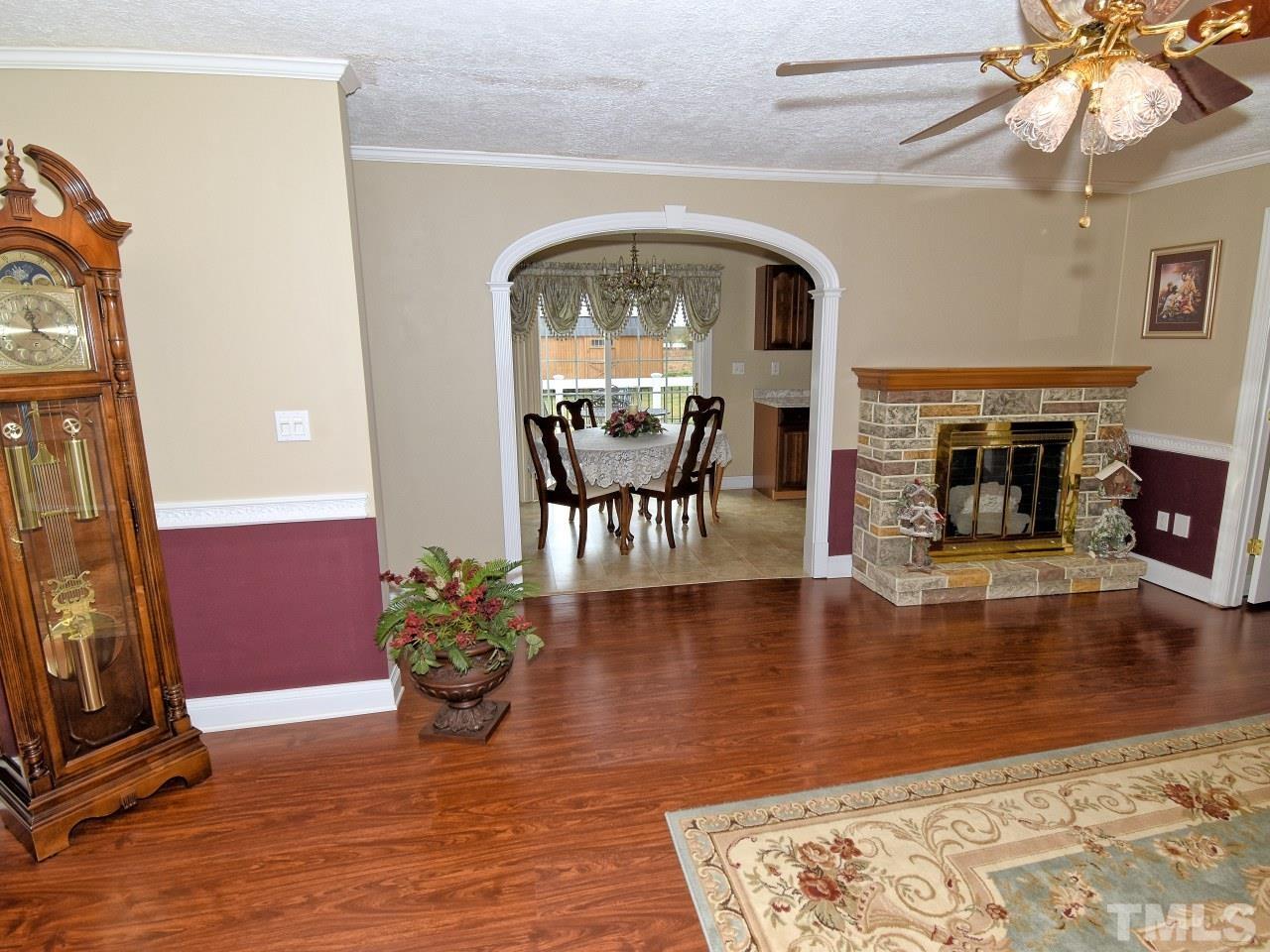 2004 Messer Road Raleigh, NC 27603 - Photo 4 of 28 a view of living room with furniture and a fireplace