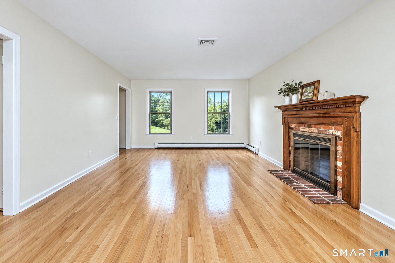 185 Nepas Road Fairfield, CT 06825 - Photo 7 of 38 Gleaming floors and newly painted walls are ready for new buyers decorating vision.