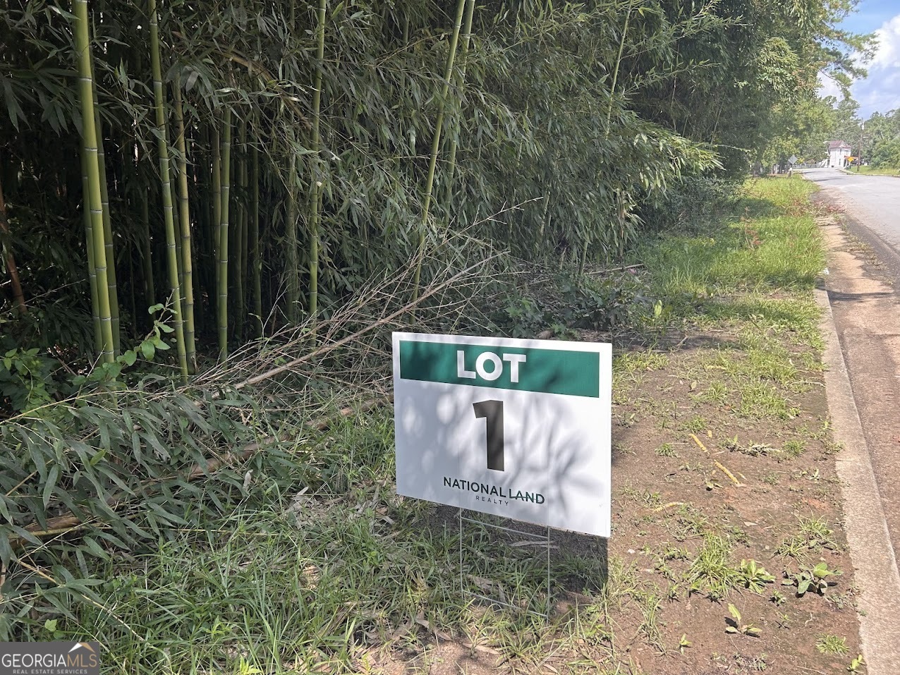 a wooden bench sitting in the middle of a forest