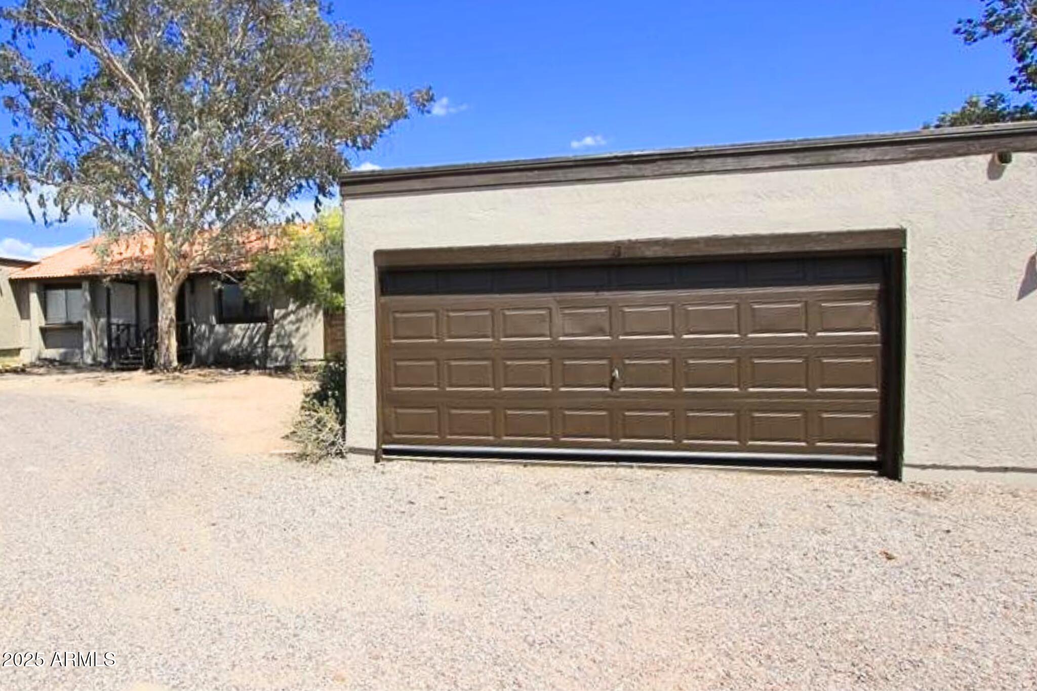 824 East Junction Street Apache Junction, AZ 85119 - Photo 1 of 9 a view of the house with a outdoor space