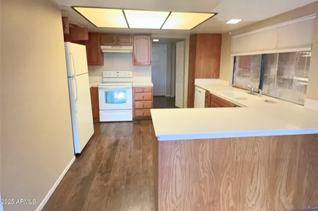 a hallway with a wooden floor