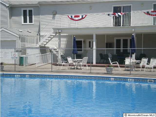 95 Halls Croft Road, Unit A Freehold, NJ 07728 - Photo 13 of 15 a view of pool table and chairs