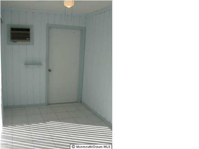 95 Halls Croft Road, Unit A Freehold, NJ 07728 - Photo 7 of 15 a view of a bathroom