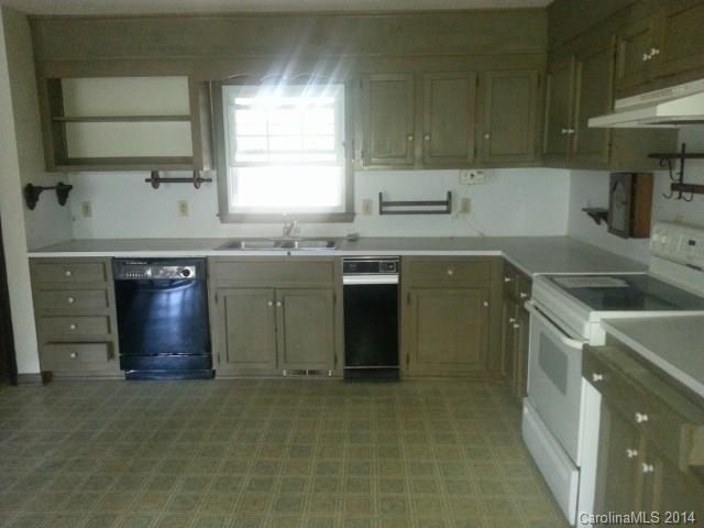 200 Hambright Road Clover, SC 29710 - Photo 3 of 10 a kitchen with a sink stove top oven and cabinets