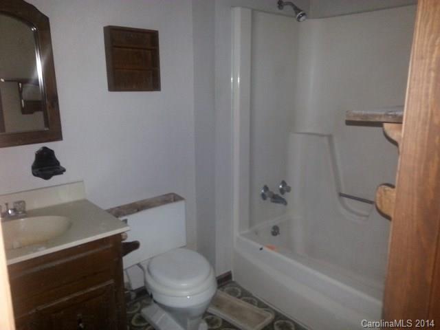 200 Hambright Road Clover, SC 29710 - Photo 5 of 10 a white toilet sitting next to a bath tub