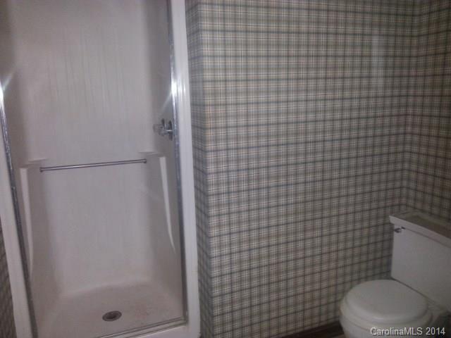 200 Hambright Road Clover, SC 29710 - Photo 7 of 10 a bathroom with a toilet and a shower