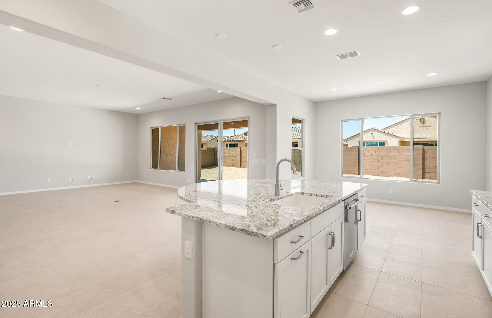 7836 West Mockingbird Way Florence, AZ 85132 - Photo 15 of 37 a bathroom with a granite countertop sink and a mirror