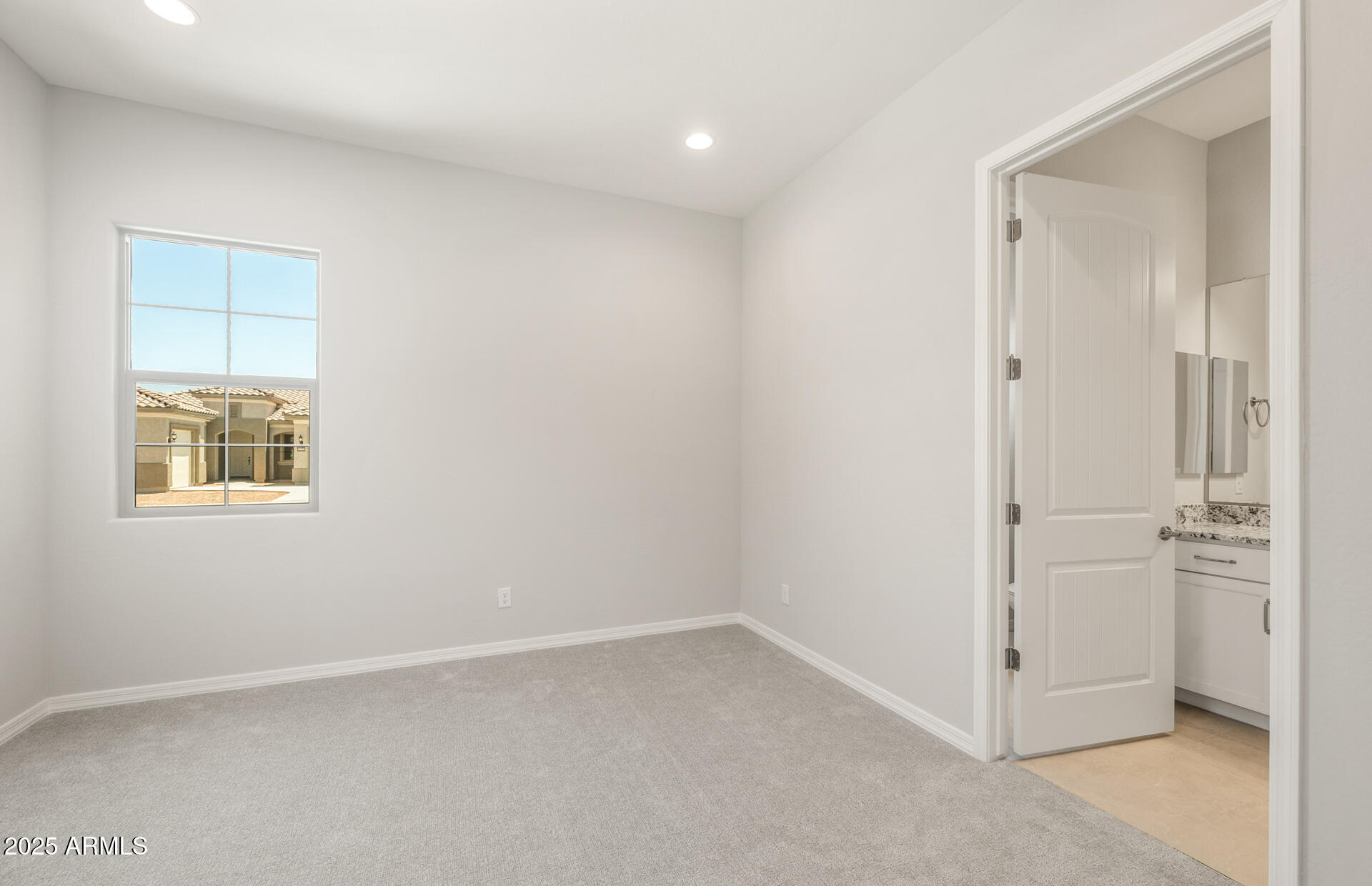 7836 West Mockingbird Way Florence, AZ 85132 - Photo 3 of 37 an empty room with windows and closet
