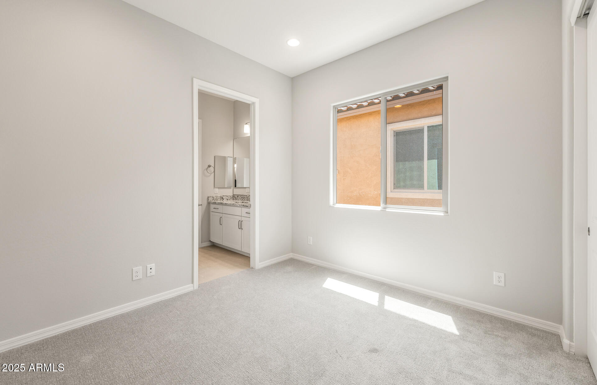 7836 West Mockingbird Way Florence, AZ 85132 - Photo 5 of 37 a view of an empty room with a window