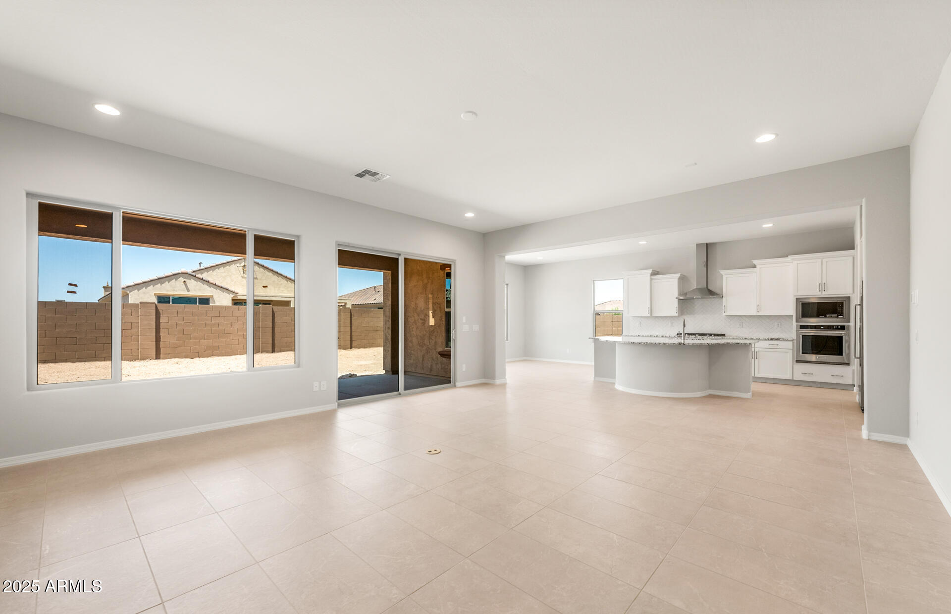 7836 West Mockingbird Way Florence, AZ 85132 - Photo 7 of 37 a view of a kitchen with a sink and cabinets