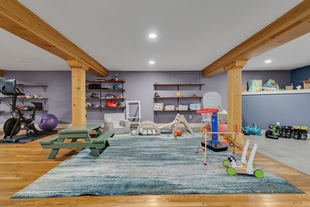 215 Mossman Road Sudbury, MA 01776 - Photo 23 of 30 a view of a room with gym equipment