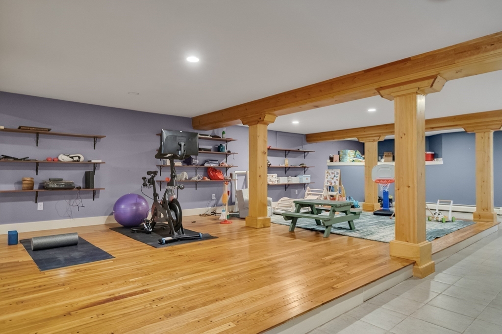 215 Mossman Road Sudbury, MA 01776 - Photo 24 of 30 a gym hall with exercise machine