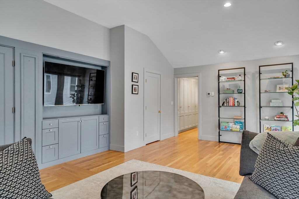 215 Mossman Road Sudbury, MA 01776 - Photo 5 of 30 a bedroom with a bed and a dresser