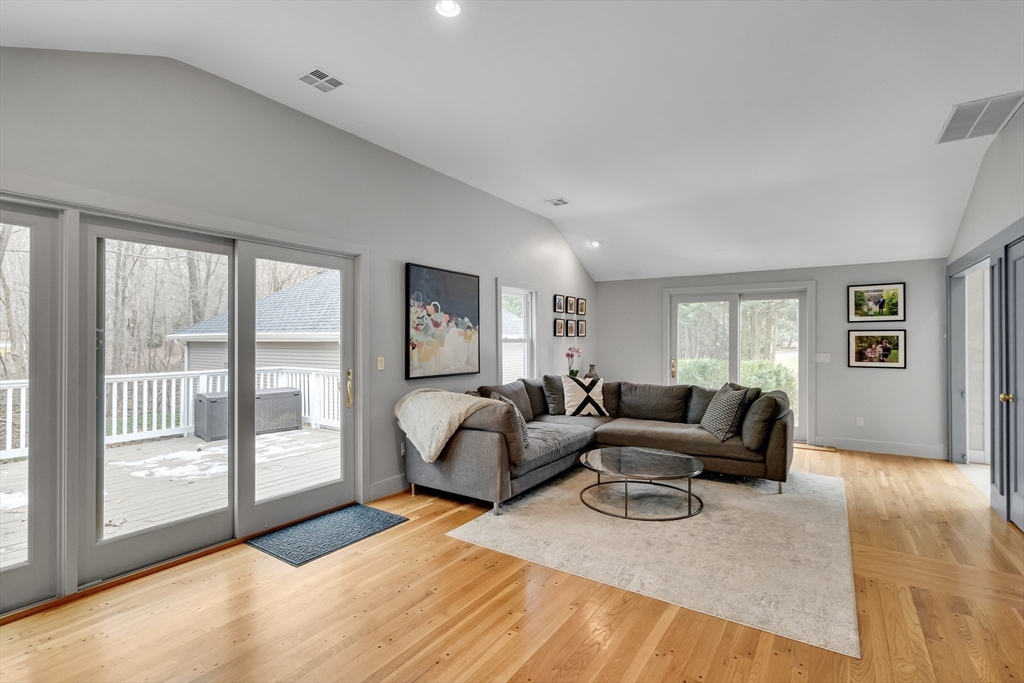 215 Mossman Road Sudbury, MA 01776 - Photo 6 of 30 a living room with furniture and a large window