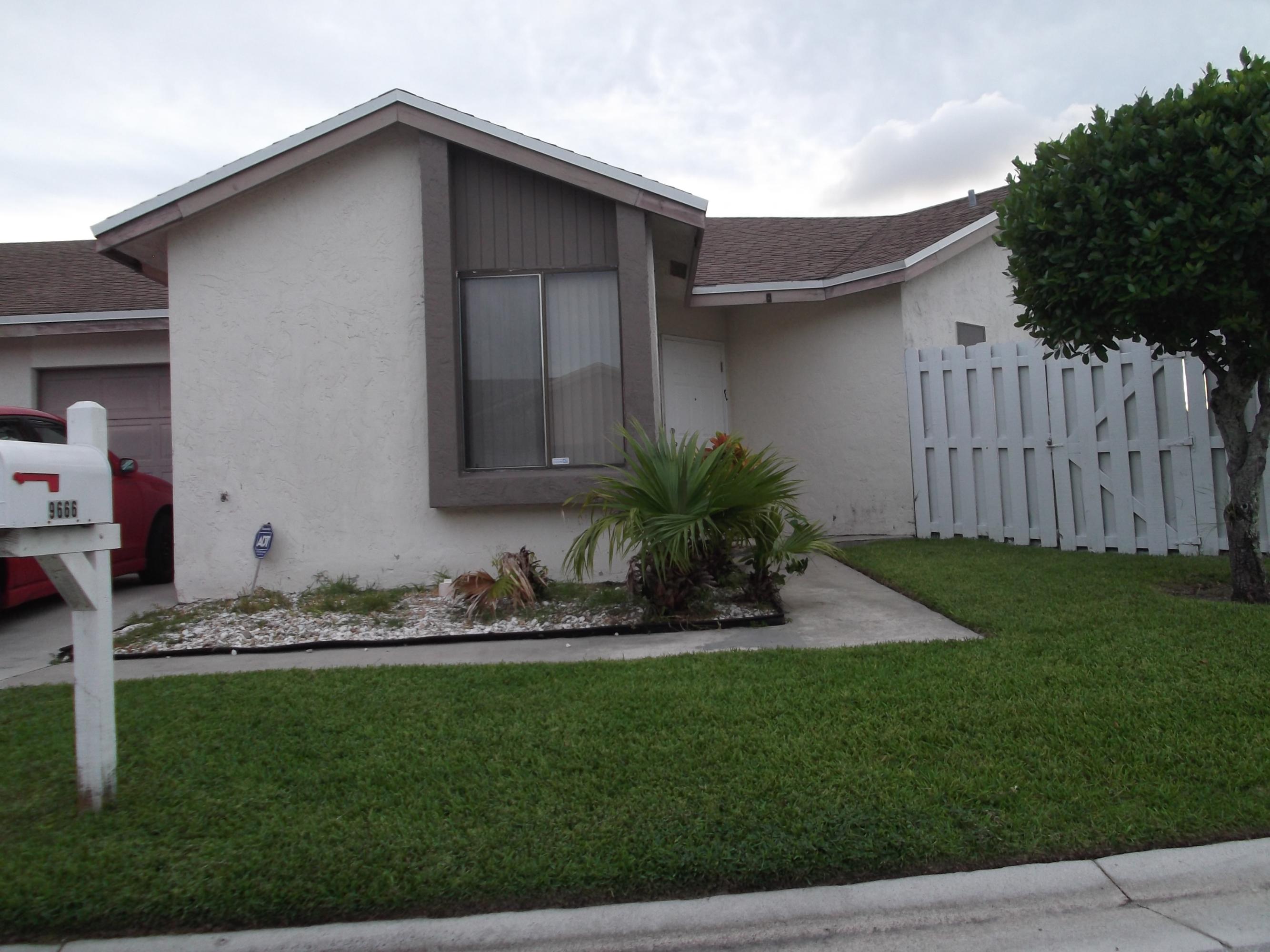 9666 Sunny Isle Circle Boca Raton, FL 33428 - Photo 1 of 10 9666 Sunny Isle Exterior Front