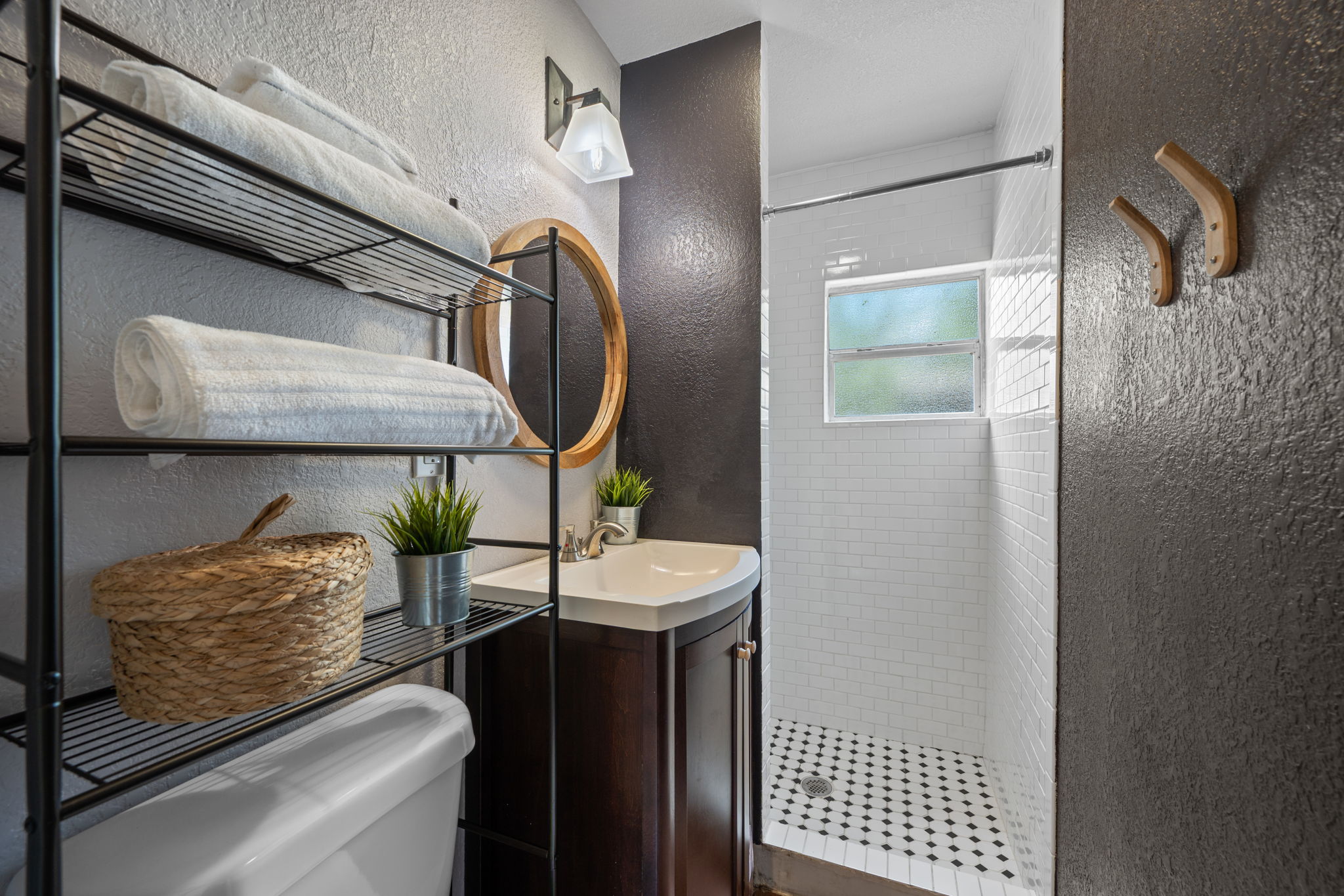 1137 Nickols Avenue Austin, TX 78721 - Photo 21 of 33 Updated hall bathroom with a walk-in shower.