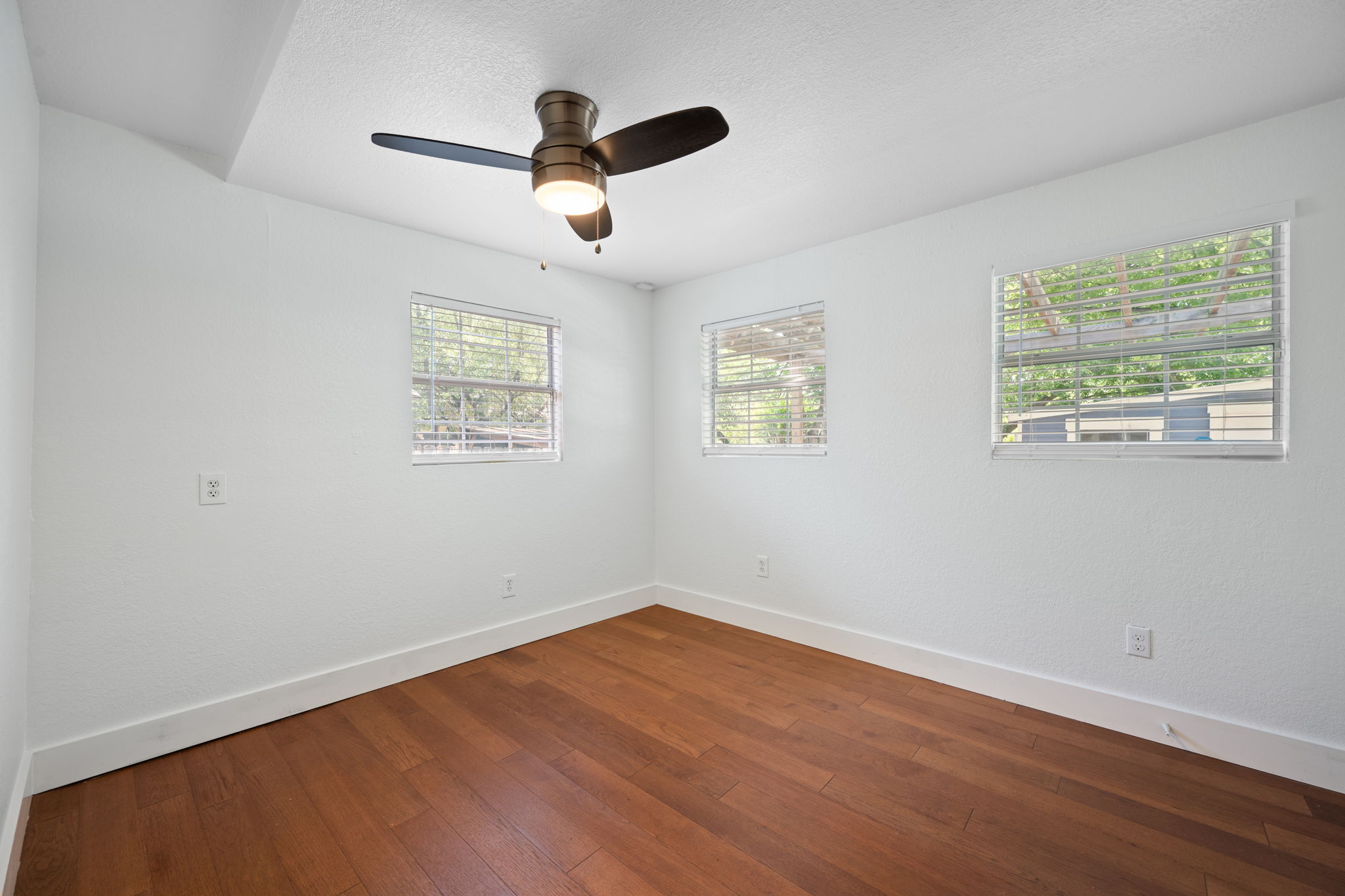 1137 Nickols Avenue Austin, TX 78721 - Photo 22 of 33 Bedroom 3 at the back of the home.
