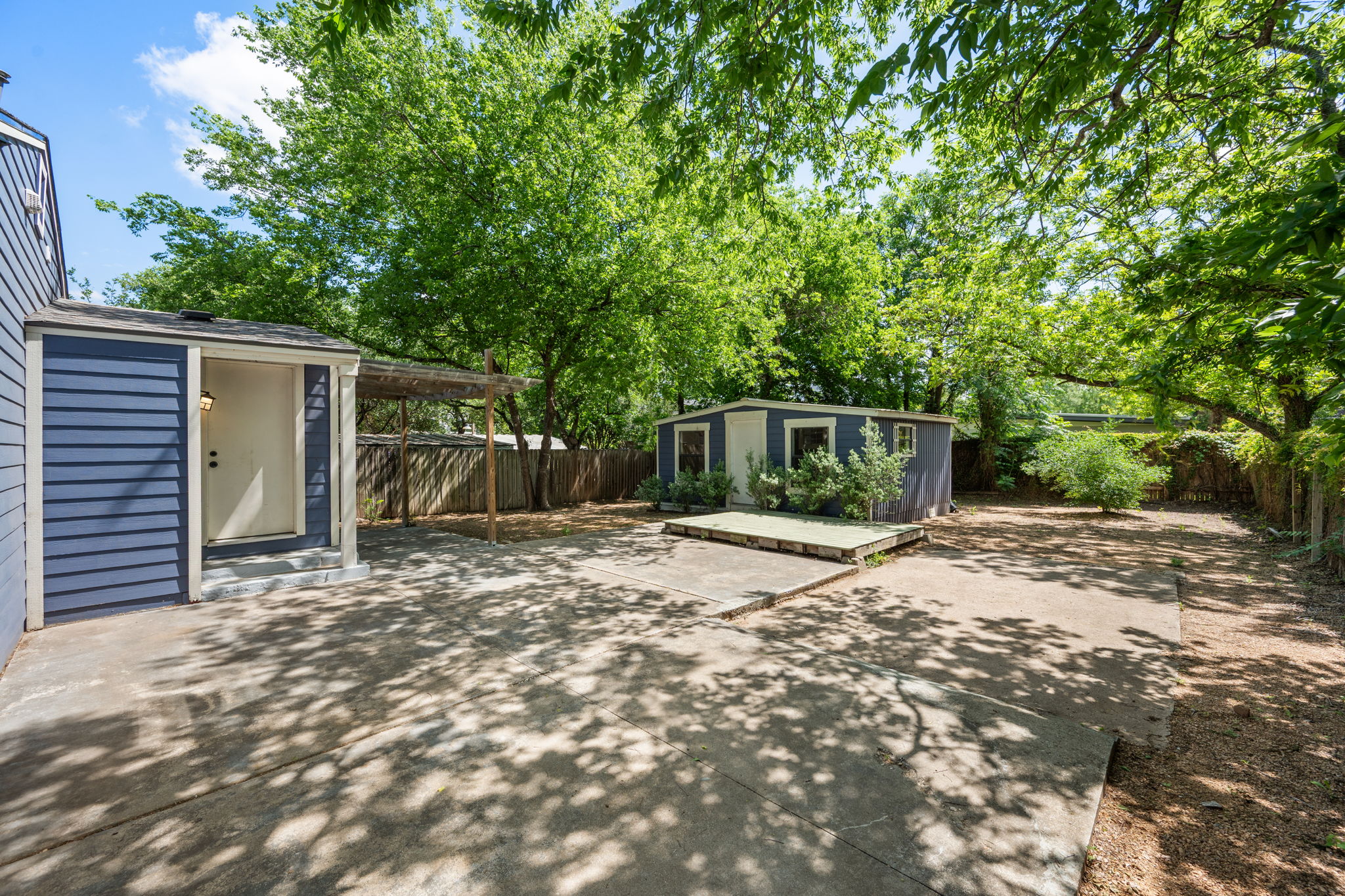 1137 Nickols Avenue Austin, TX 78721 - Photo 24 of 33 Large yard with a patio, deck and an outbuilding.