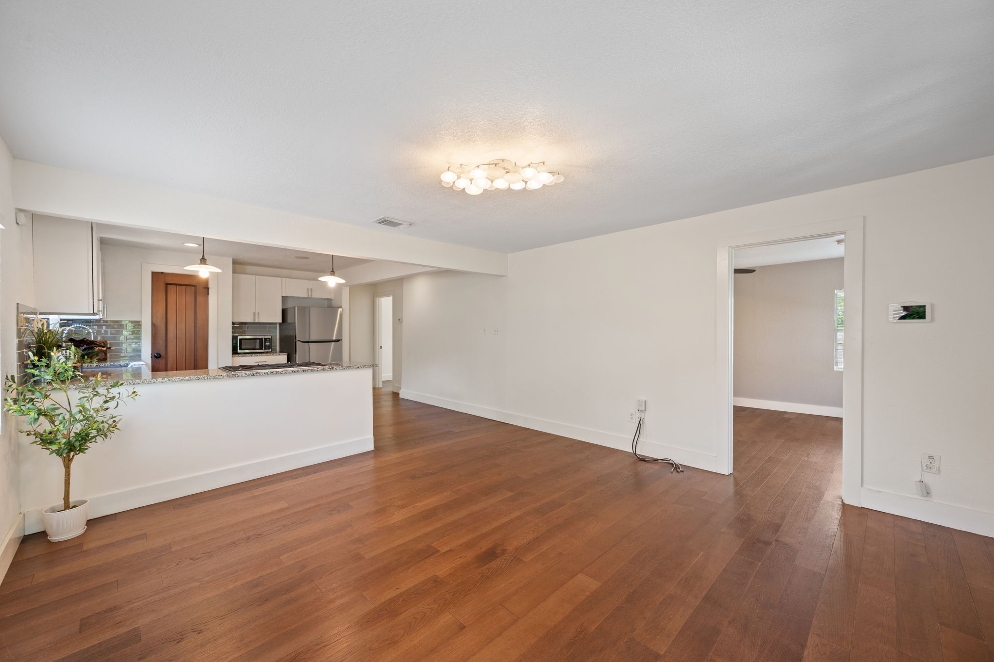 1137 Nickols Avenue Austin, TX 78721 - Photo 6 of 33 Kitchen overlooks spacious living room.