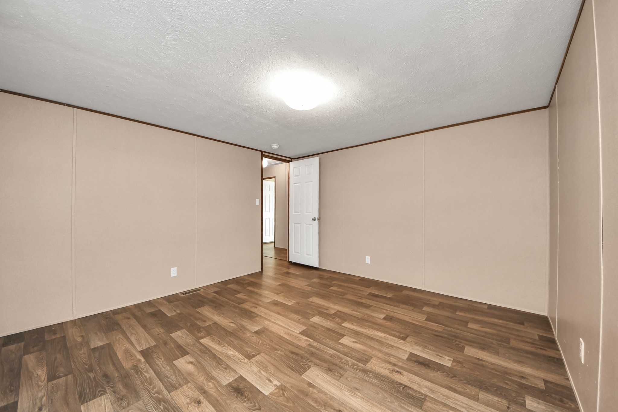 18292 Bellfounder Drive Conroe, TX 77306 - Photo 11 of 17 Spacious bedroom (#3) with room for a full or queen setup and storage.