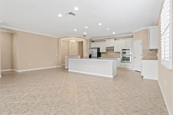 a view of a dining room with furniture