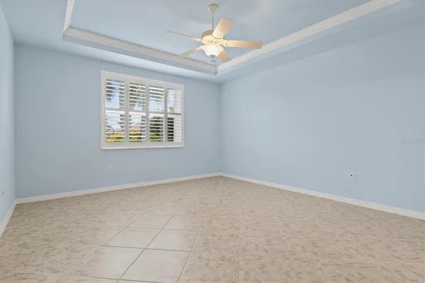 a spacious bathroom with a double vanity sink mirror and shower