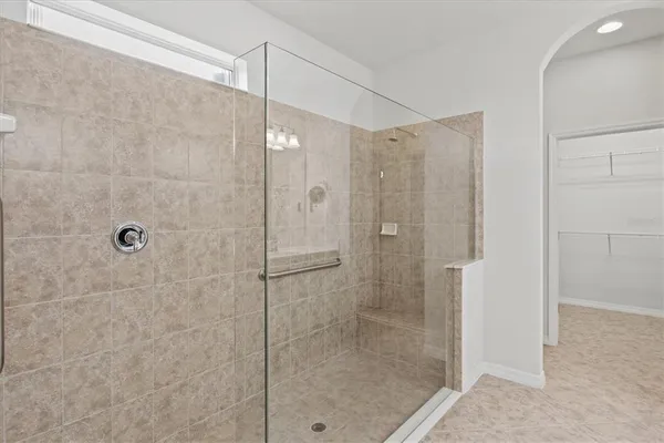 an empty room with closet area