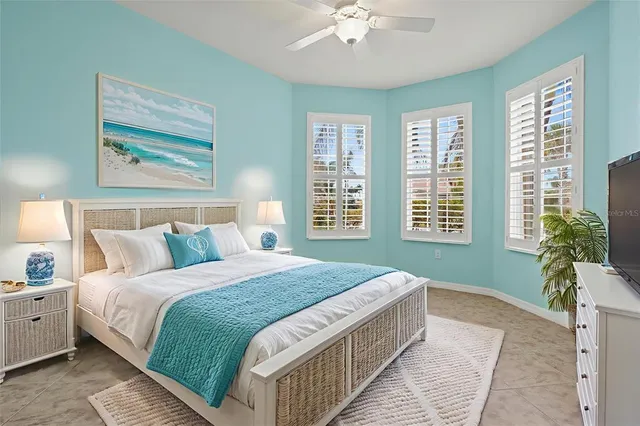 a view of a patio with a dining table and chairs with a fire pit