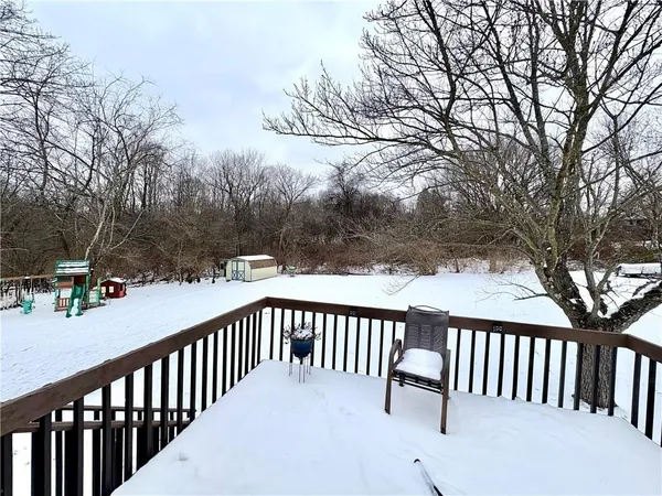 a view of a balcony with a pot