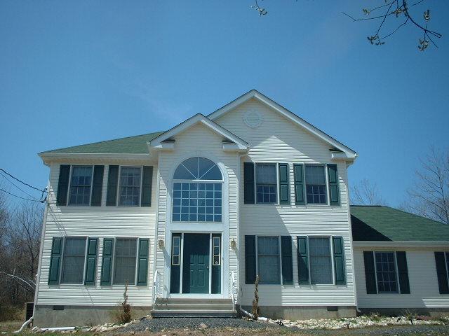 5553 Granite Road Long Pond, PA 18334 - Photo 6 of 8 a front view of a house with a yard
