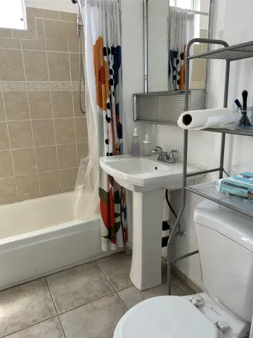 a kitchen with a stove and a refrigerator