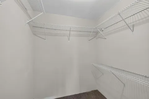 a view of a room with racks on the wall