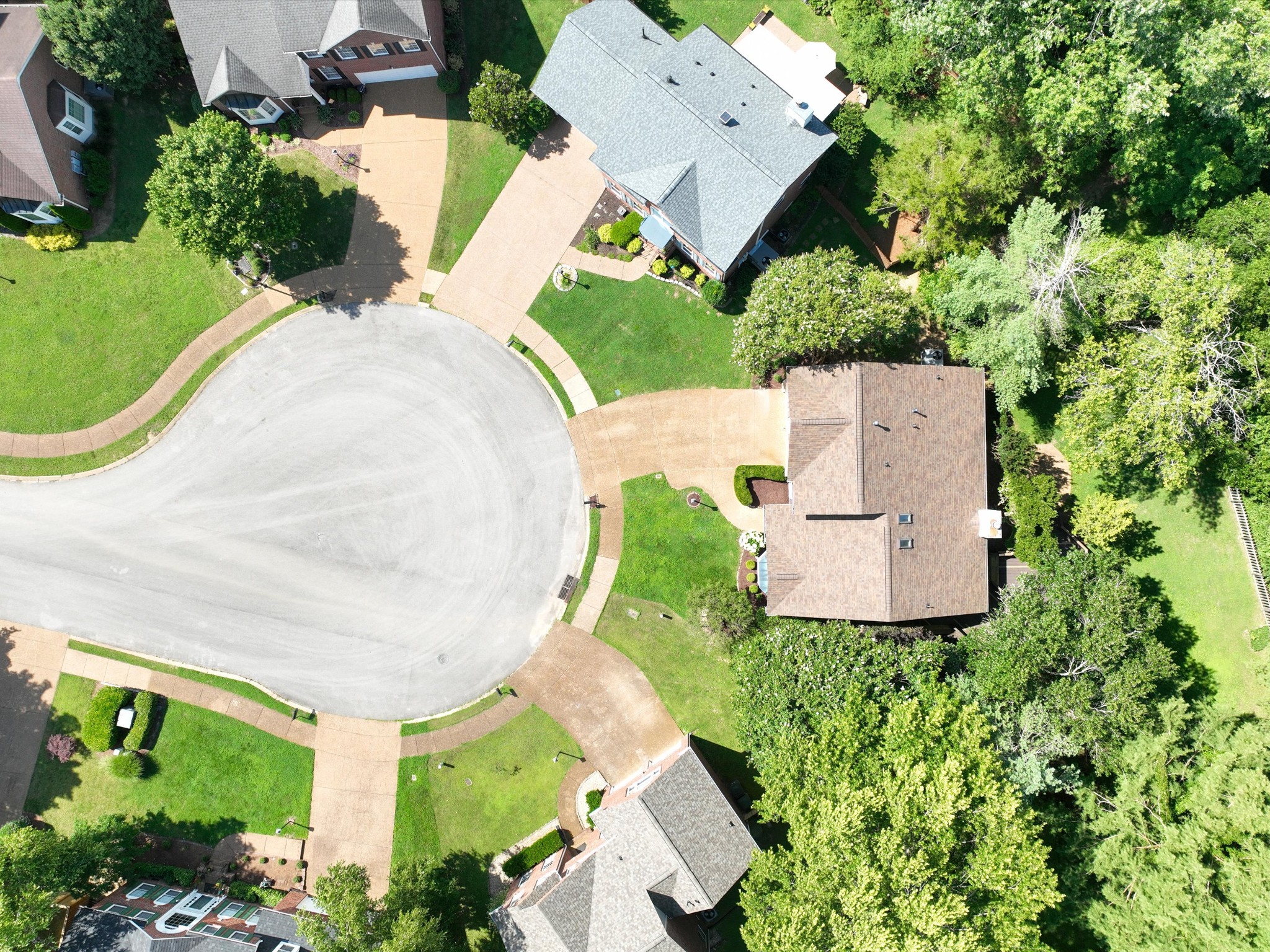 4629 Sandy Creek Road Nashville, TN 37221 - Photo 43 of 48 an aerial view of a house with a garden and trees