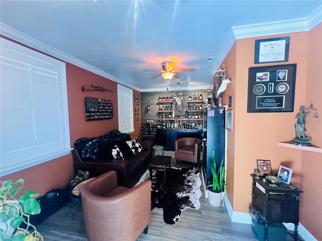 357 Tymber Run Ormond Beach, FL 32174 - Photo 20 of 32 a room with furniture and wooden floor