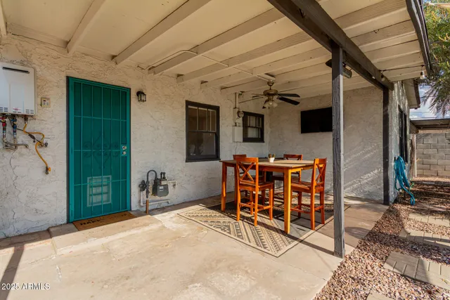 a front view of a house with garden and porch