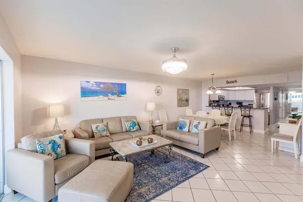 a living room with furniture and a couch