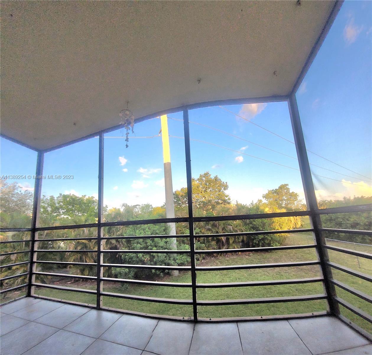 3490 Foxcroft Road, Unit B202 Miramar, FL 33025 - Photo 18 of 29 a view of outdoor space with seating