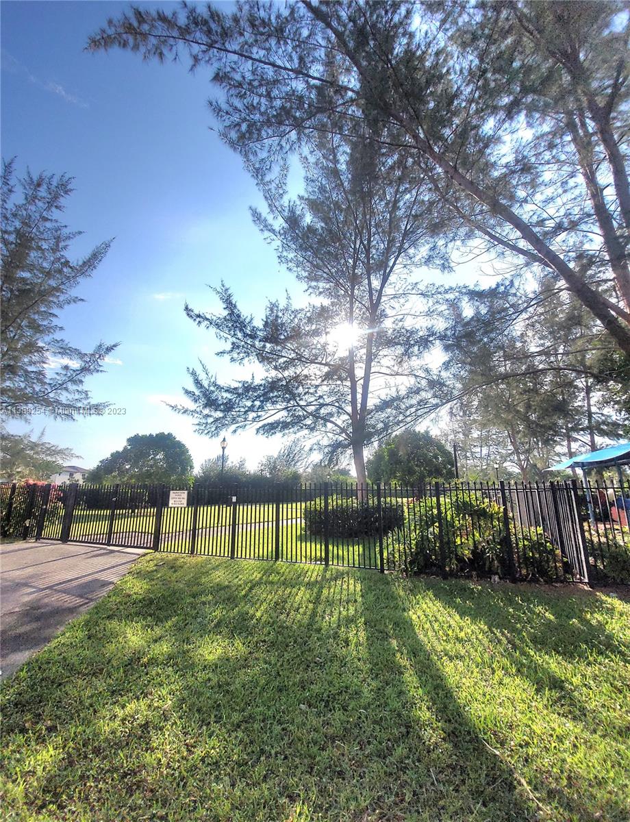 3490 Foxcroft Road, Unit B202 Miramar, FL 33025 - Photo 4 of 29 a view of house with a yard