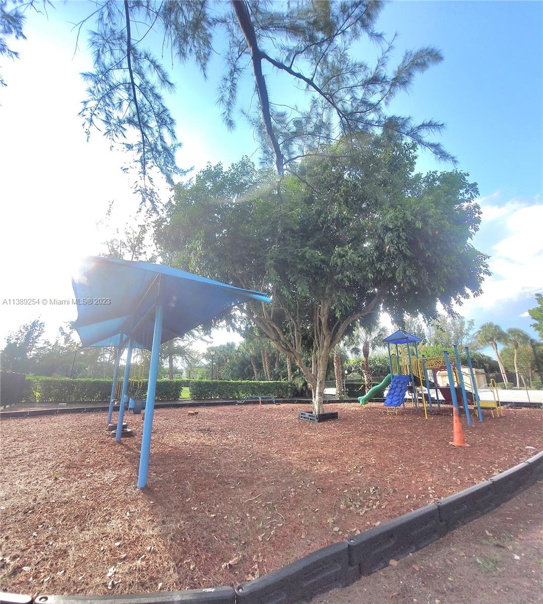 3490 Foxcroft Road, Unit B202 Miramar, FL 33025 - Photo 7 of 29 a view of street with houses