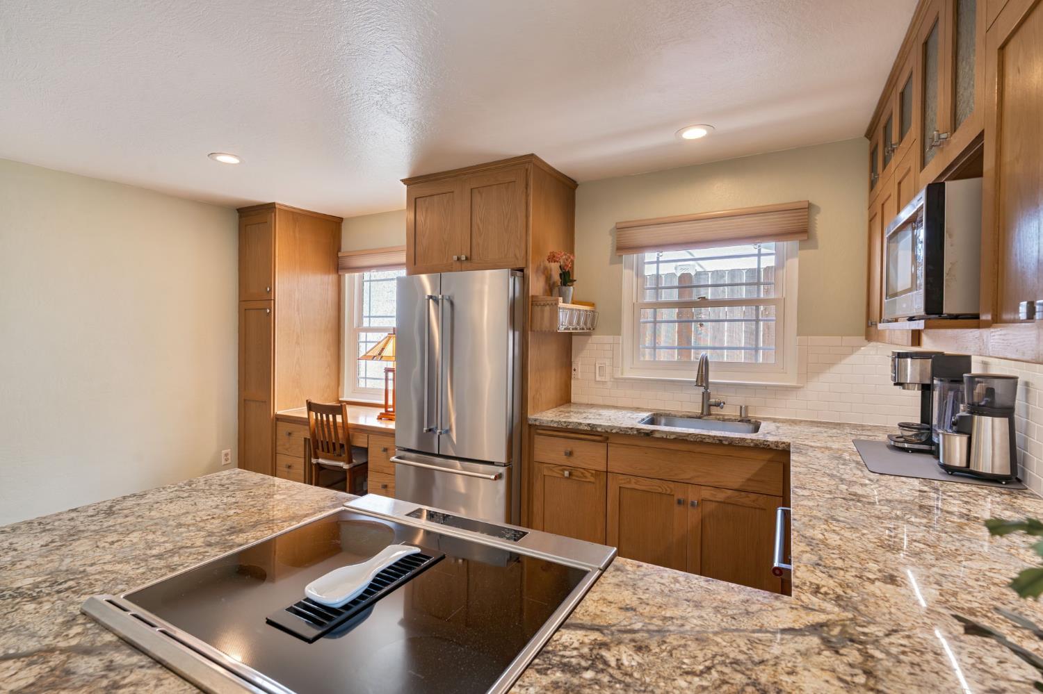 5422 Earnell Street Carmichael, CA 95608 - Photo 17 of 39 a kitchen with a refrigerator and a sink