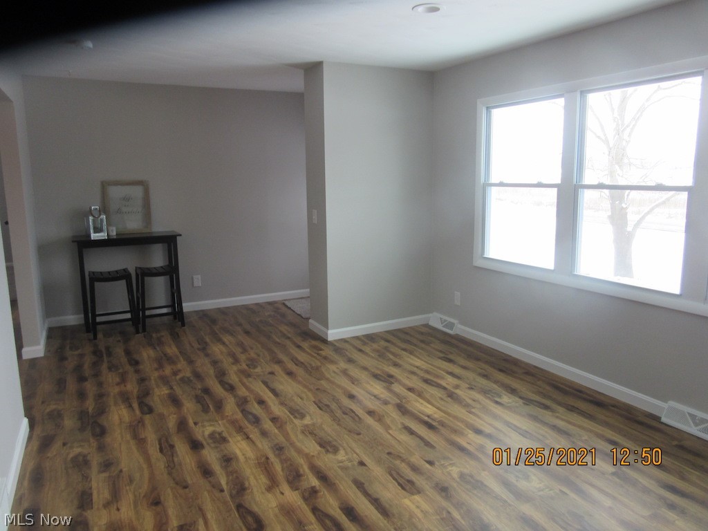 3749 Blackmore Road Perry, OH 44081 - Photo 4 of 25 living room w/ premier vinyl plank flooring and fresh paint