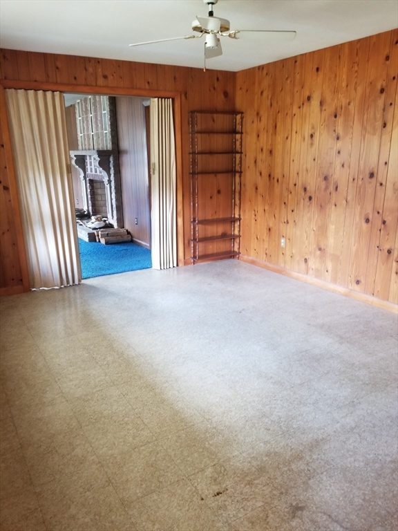 84 Greenwich Road Ware, MA 01082 - Photo 8 of 11 an empty room with windows & cabinet
