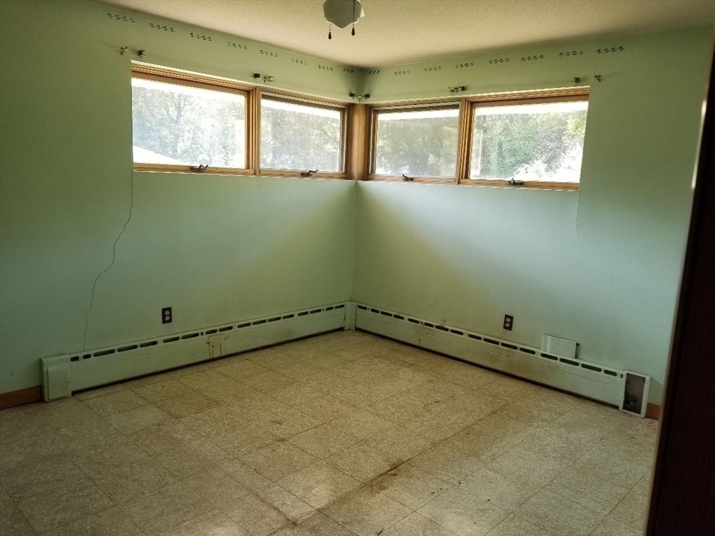 84 Greenwich Road Ware, MA 01082 - Photo 9 of 11 an empty room with windows