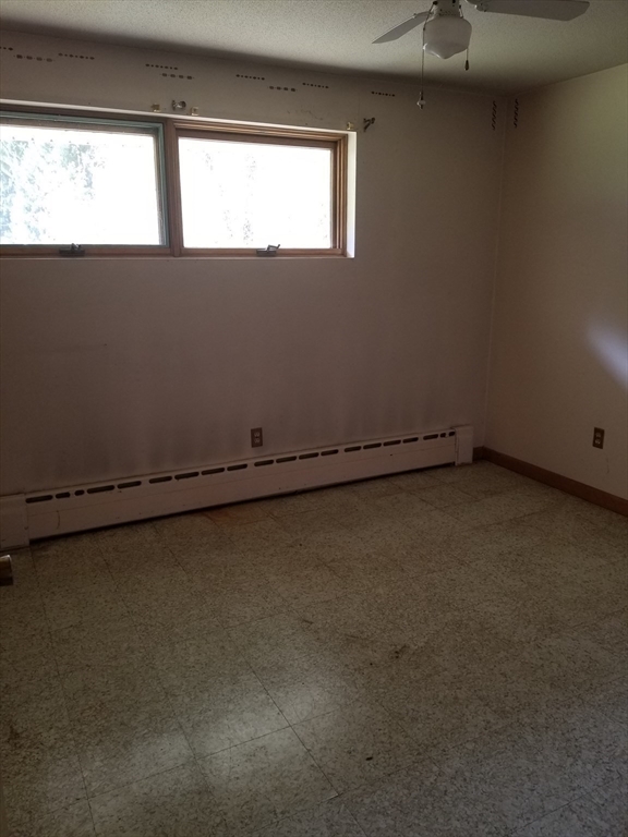 84 Greenwich Road Ware, MA 01082 - Photo 10 of 11 an empty room with a window