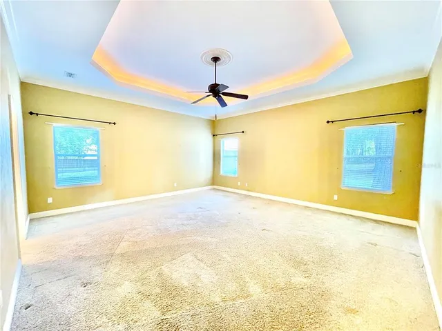 a view of a living room and dining room